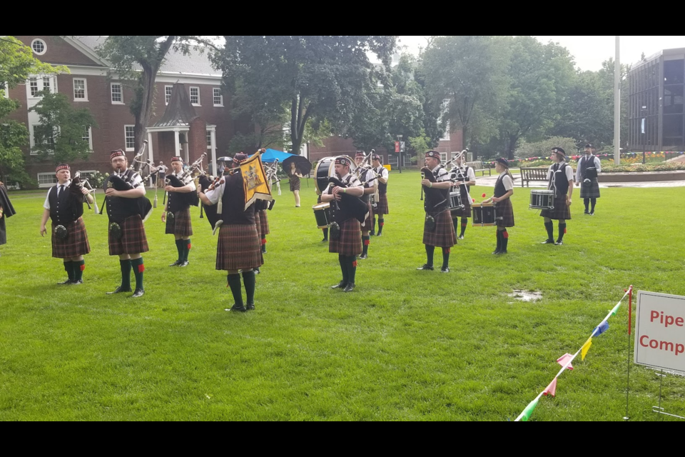 It was a rainy day in St. Paul where the Pipes and Drums of Thunder Bay participated in the Minnesota Scottish Fair & Highland Games (submitted photo)