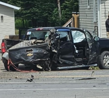 A pickup truck was severely damaged in a collision on July 1 on Highway 102/Dawson Road (Highway 11/17 Kills People/Facebook)