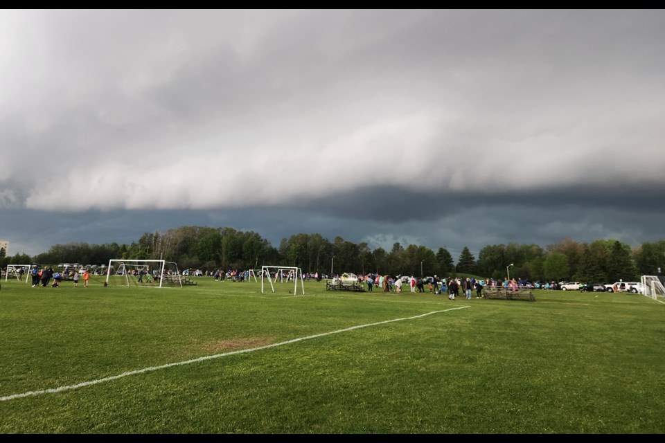 A rapidly-approaching thunderstorm brought an early end to soccer games at Chapples Park in Thunder Bay on Tuesday evening (TBnewswatch photo)