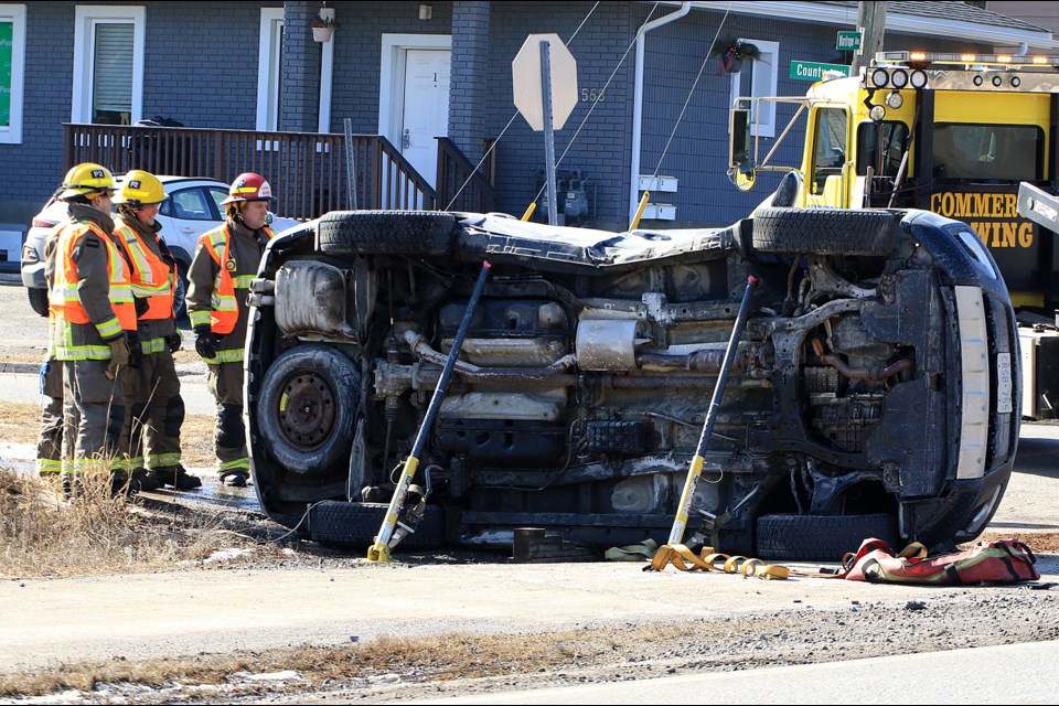 A vehicle ended up on its side the early afternoon of March 1, 2024 at the intersection of County Boulevard and Wardrope Avenue, the result of a two-vehicle crash. (Leith Dunick, tbnewswatch.com)