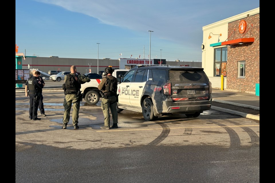 Several officers responded to the 900 block of Fort William Road on Friday.