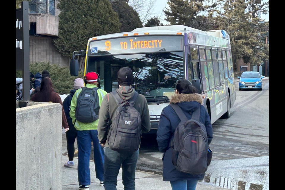 Thunder Bay Transit bus picking up passengers at Lakehead University on Friday, March 1, 2024 