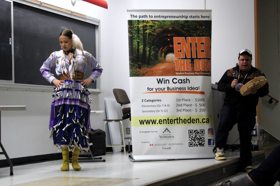 Westgate High School student Eryn Genno performs a jingle dress dance as part of her presentation during the Enter the Den competition at Hammarskjold High School on Wednesday, May 8. 