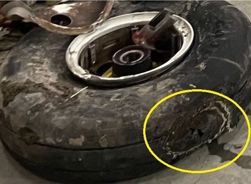 The plane sustained significant damage, including to this tire on the main landing gear (North Star Air/TSB)