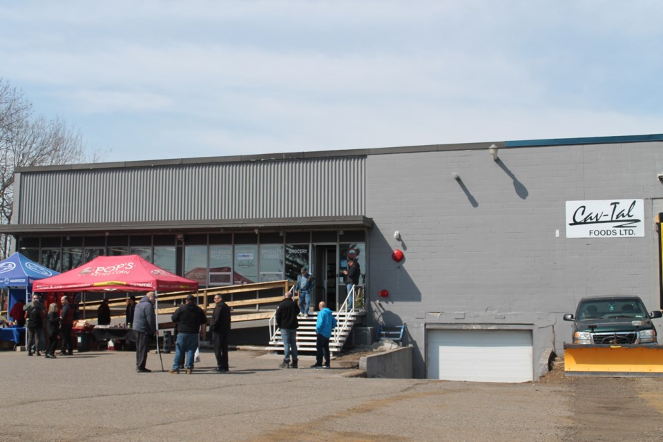 The Cav-Tal Foods and Bay Meats storefront at 701 Norah Cres. 