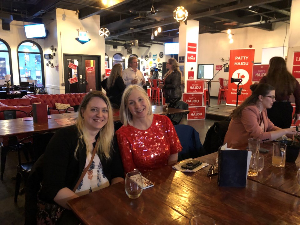 Thunder Bay-Superior North Liberal incumbent Patty Hajdu with a supporter at her election night watch party.