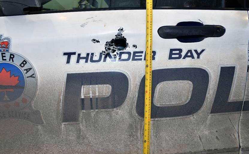 A hole was left in a Thunder Bay Police Service vehicle after a man shot at police on Dec. 26, 2024 near Kakabeka Falls. (police handout)