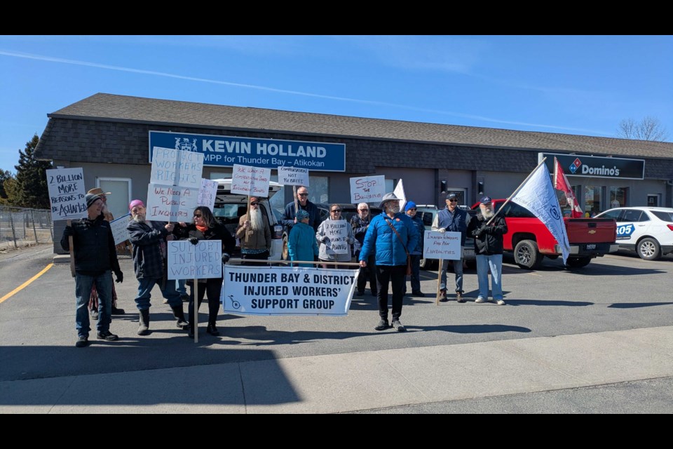 Thunder Bay and District Injured Workers Support Group (TBDIWSG) held a rally outside Thunder Bay-Atikokan MPP Kevin Holland’s constituency office after the Ford government announced they are using WSIB Accident Fund to help companies impacted by U.S. tariffs. (April 16, 2025)