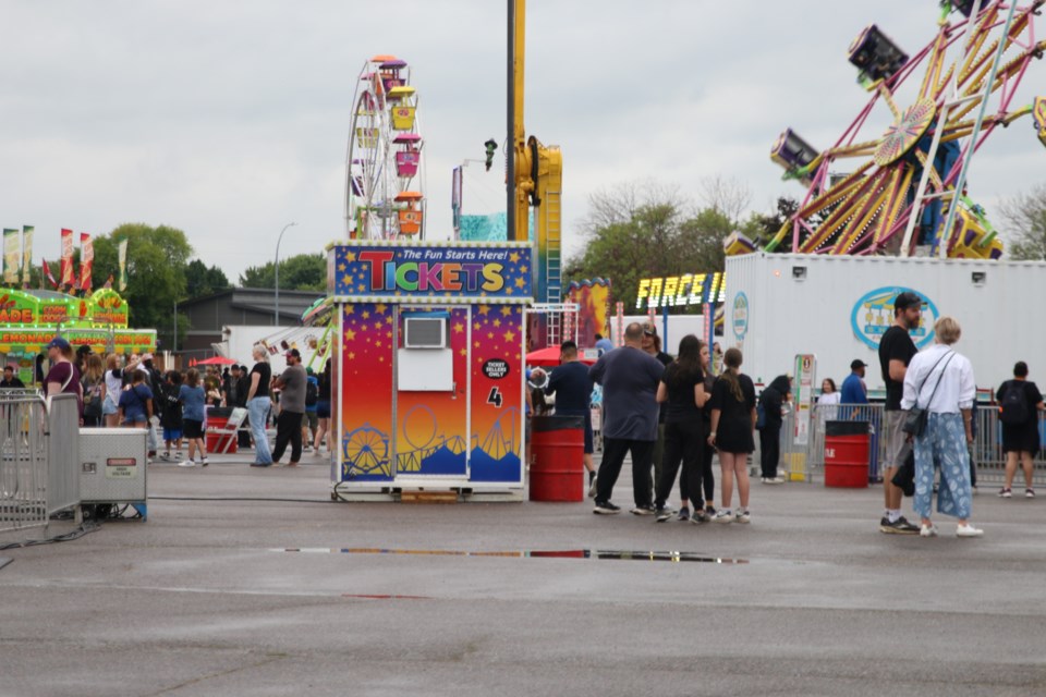 Despite a rain-filled morning and afternoon, dozens of visitors made the most of their day at the Canadian Lakehead Exhibition (CLE) on Aug. 9.