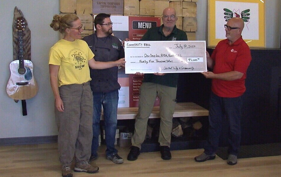 The United Way of Thunder Bay presents the Dew Drop Inn, the Regional Food Distribution Association (RFDA) and the Roots Community Food Centre with a $45,000 cheque on Aug. 6.