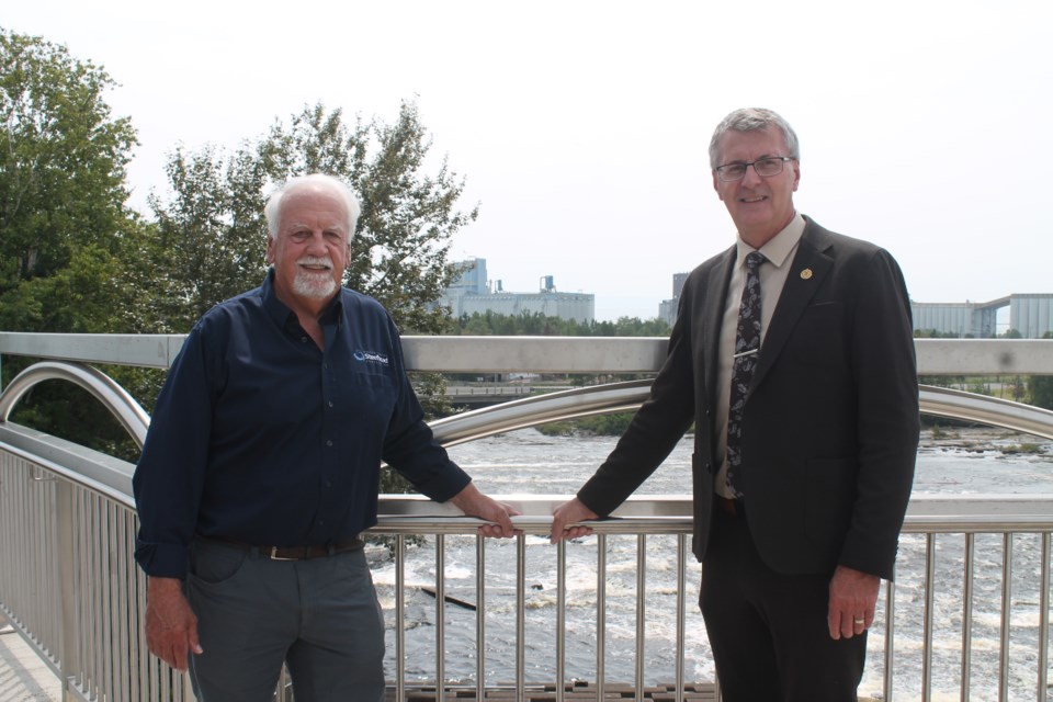 Frank Edgson, project manager for Northshore Steelhead Association (left) and Kevin Holland, MPP for Thunder Bay-Atikokan