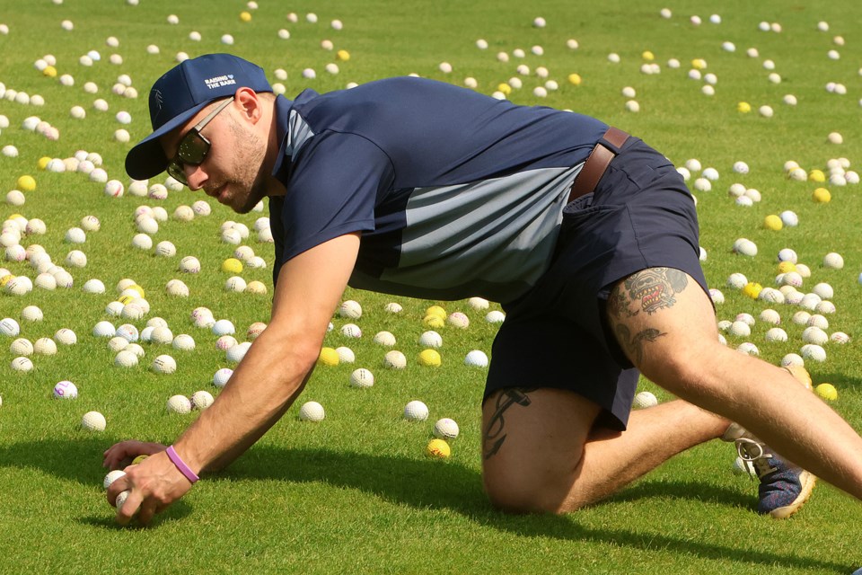 More than 4,000 golf balls were dropped on the the fairway at Whitewater Golf Club on Friday, Aug. 15, 2025, during the Raising the Barr Golf Balls from Heaven fundraising event. (Leith Dunick, tbnewswatch.com)