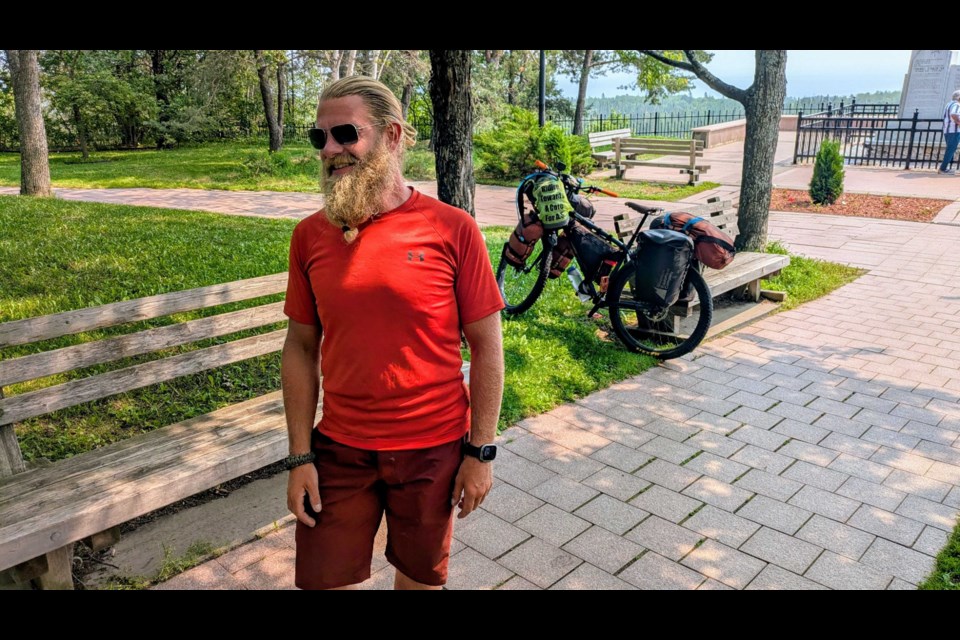 Tyler J. Ashton briefly returns to Thunder Bay Terry Fox Lookout on his second cross-country trip in support of ankylosing spondylitis (A.S.) research on Aug. 5, 2025.