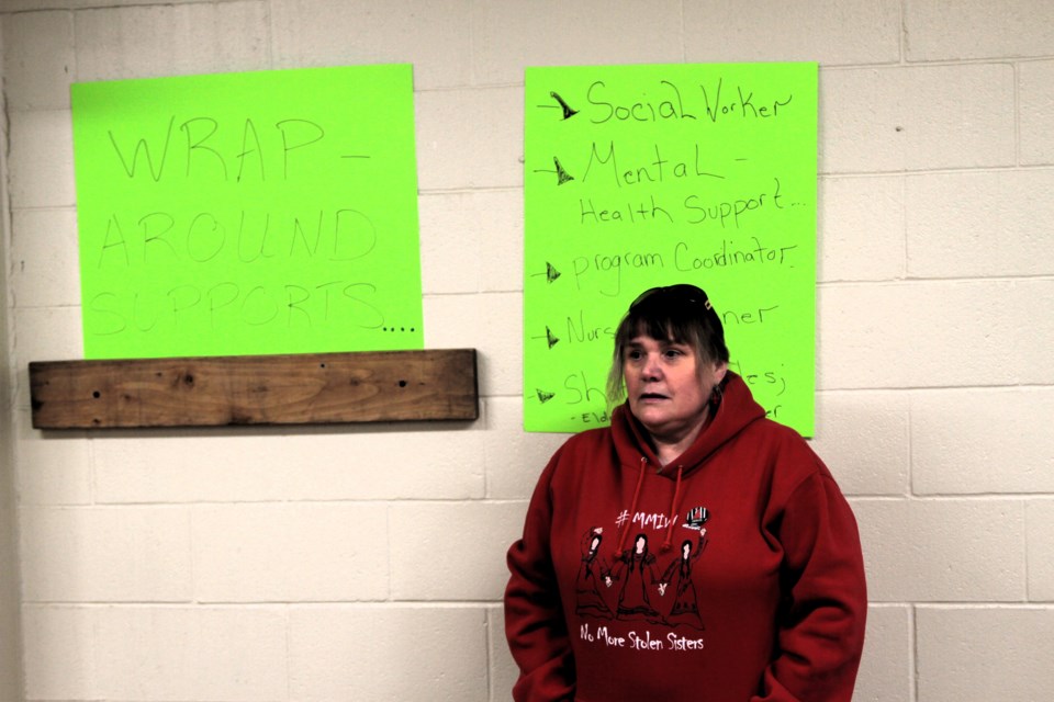 Rally organizer Tracey MacKinnon calls on the TBDSSAB to do some to help the residents of McIvor Court.