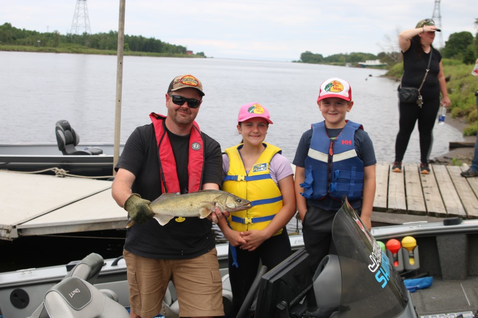 Children and youth compete on the Kaministiquia River to catch the largest walleye for the second annual Thunder Bay Young Anglers youth walleye tournament on July 5. All fish caught for the tournament were later released back into the water.