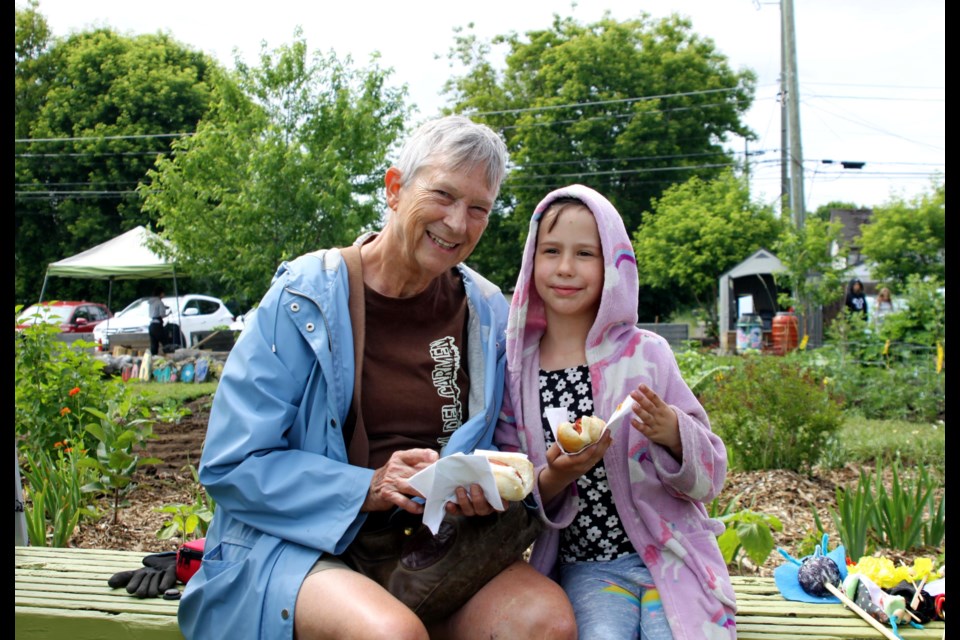 Community members attend the barbeque on July 9, 2025.