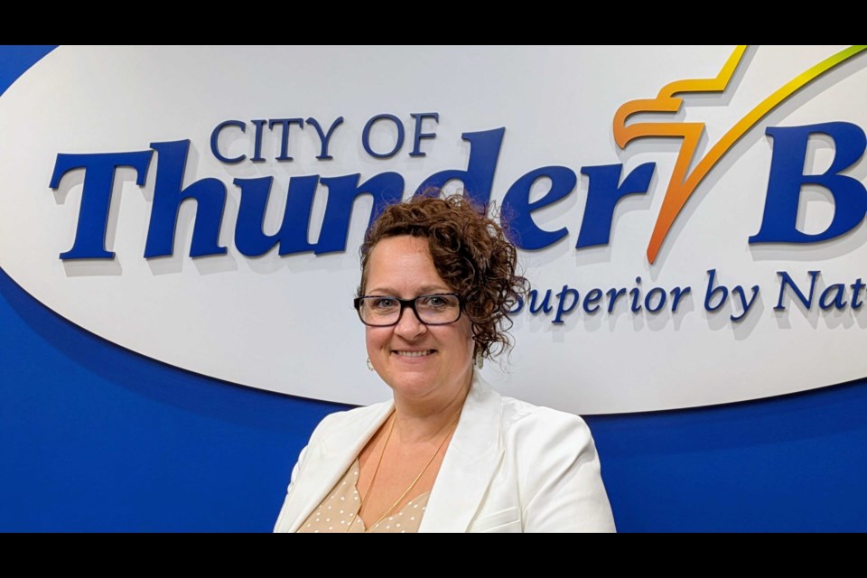 Cynthia Olsen announces the next steps for the temporary shelter village on the Hillyard lands on July 28, 2025.   