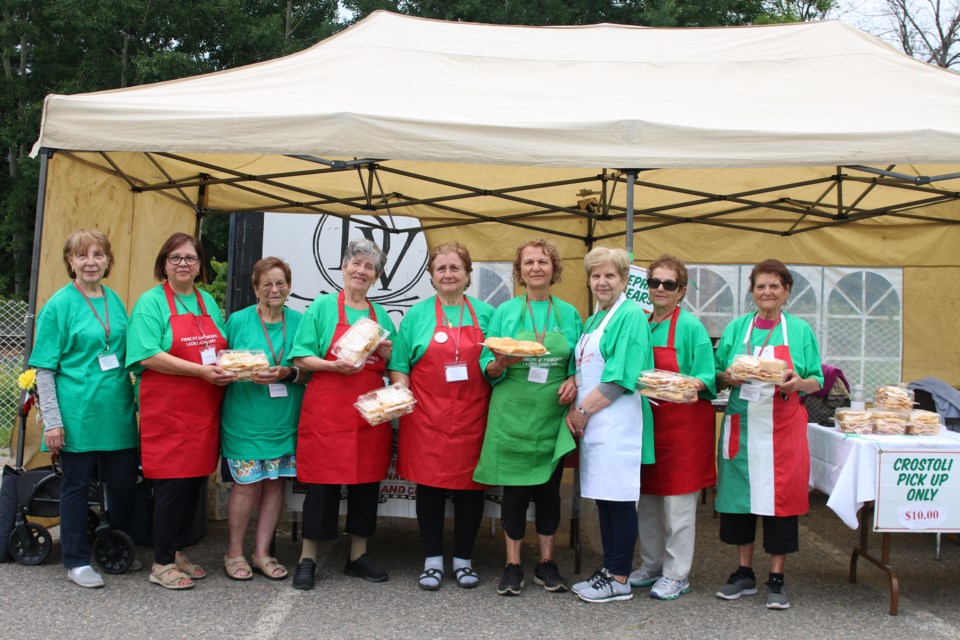 The Da Vinci Centre celebrates its 50th anniversary in Fort William’s East End from July 11 to 13. Theresa Ciccone, the president of the association’s Ladies Auxiliary, Principe Di Piemonte Societa Italiana, middle, stands with treasurer Connie Lento, second from the left, and other volunteers at a booth they run selling elephant ears at the festival.