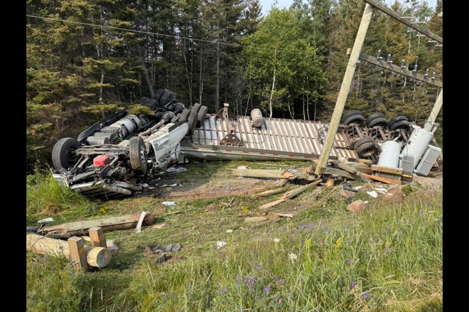 A tractor-trailer was badly damaged after it left the road and overturned in a ditch by Highway 102 outside Thunder Bay (Angel Ribeiro/Take Back 102 Facebook)
