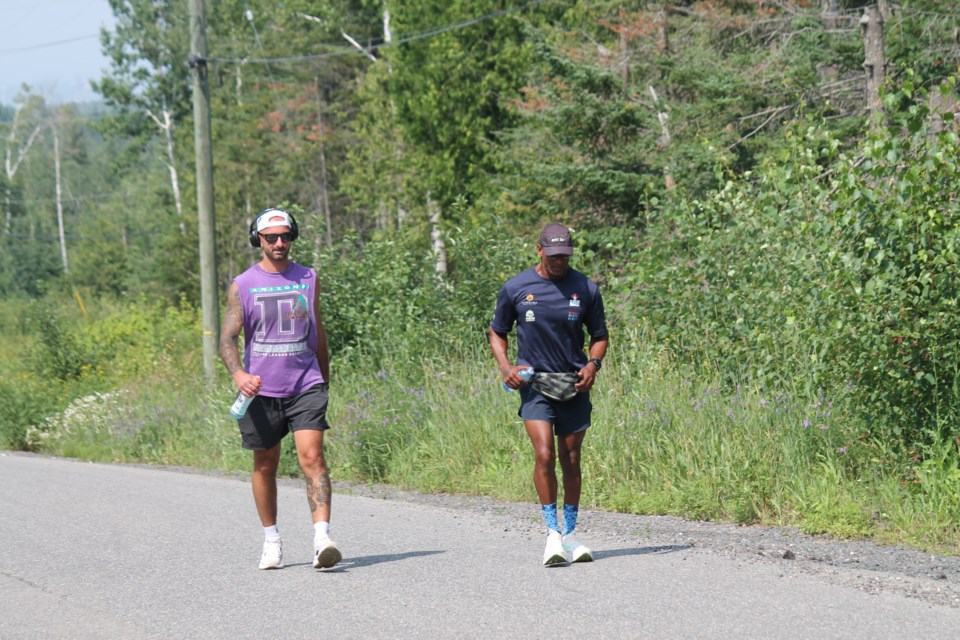 Sachin Latti (right) was running with a Thunder Bay resident on July 24, 2025.