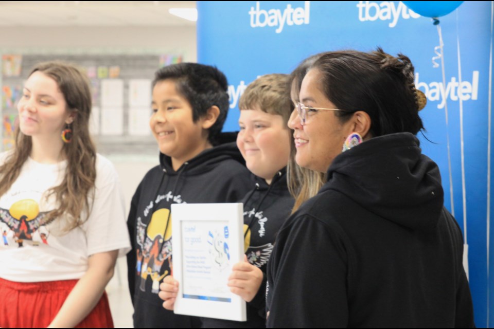 Esther Maud and students accept their Tbaytel for Good Community Fund award on June 20, 2025.