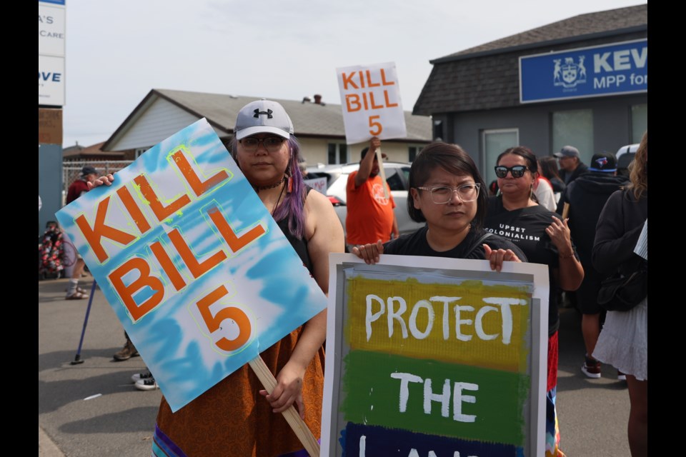 Corrina McKay, left, and Lucille Atlookan participate in the Kill Bill 5 rally June 12, 2025, in front of MPP Kevin Holland's office in Thunder Bay.