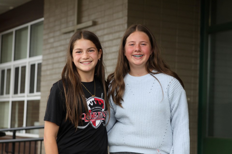 St. Bernard Elementary School students Avery Williamson and Samantha Baoga celebrate the last day of school on June 27, 2025