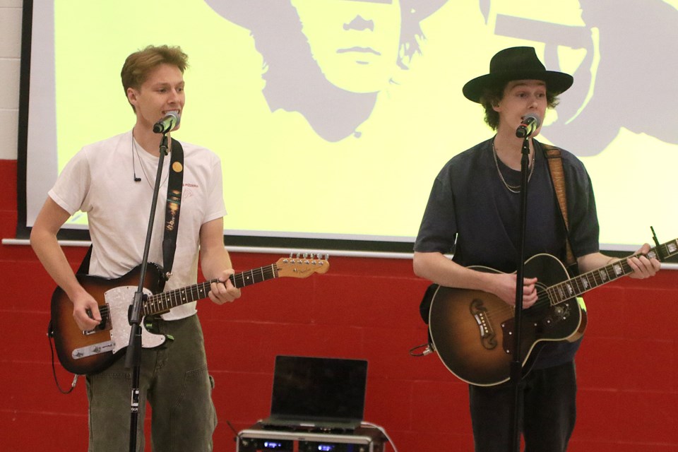 The Lockyer Boys, William (left) and Charlie, play a show for students at the C.D. Howe Public School on Friday, June 20, 2025. (Leith Dunick, tbnewswatch.com)