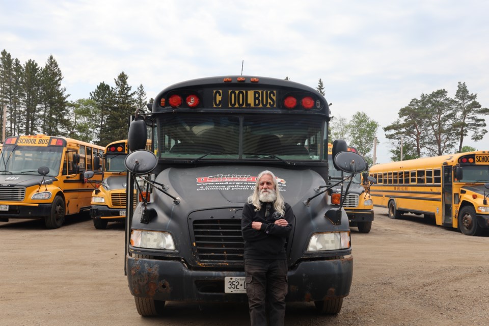 Peter Panetta stands with the cool bus at Iron Range on June 5, 2025. 