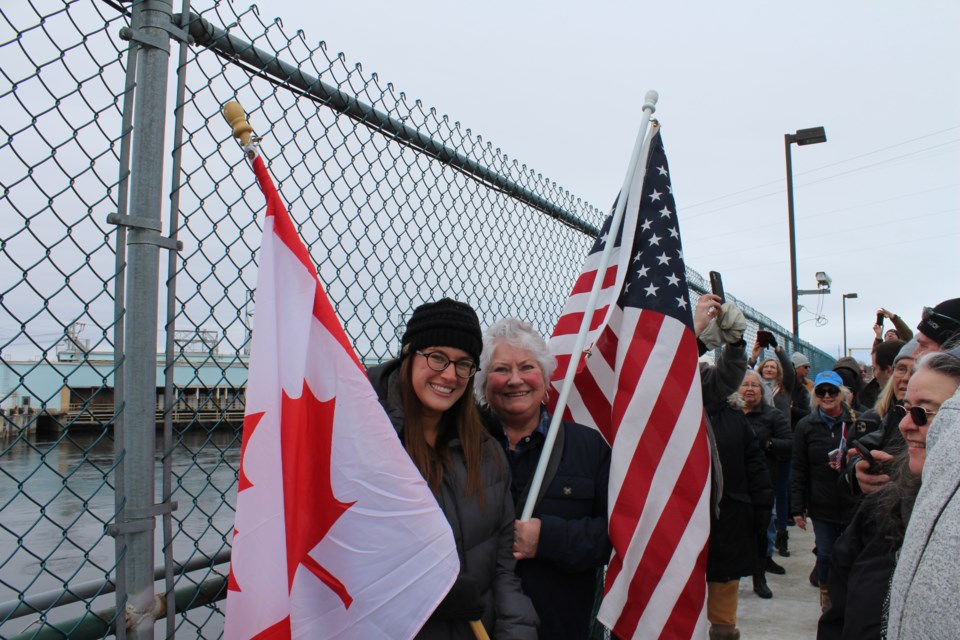 Residents on both sides of the Canada-United States border met at the border crossing bridge between Fort Frances and International Falls to hold hands in allyship at the International Boundary Line on March 29.