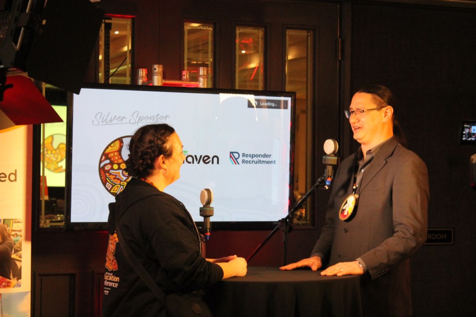 James Vukelich Kaagegaabaw (right)