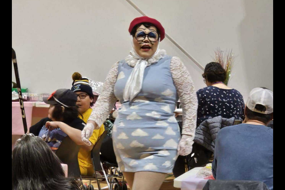Olive Boogits performing at Mikinaak Onigaming School.