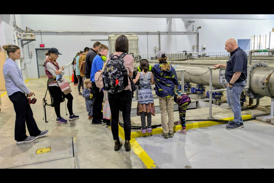 Residents are shown tanks at the Bare Point Water Treatment Plant where membrane ultra-filtration technology filters the water of viruses and bacteria on May 22, 2025.