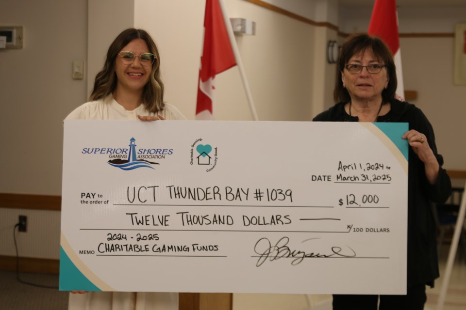 Superior Shores Gaming Association, a non-profit gaming centre, presents the United Commercial Travellers (UCT) Thunder Bay #1039 with a $12,000 cheque on June 7.