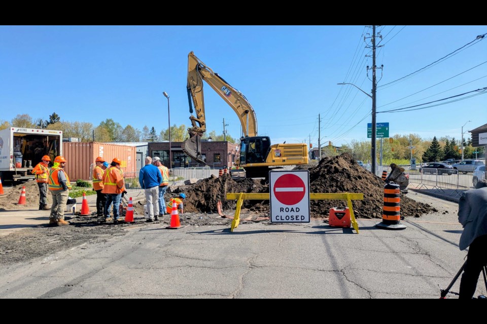 Crews work on capping and removing the existing water main on Cumberland Street on May 28, 2025.