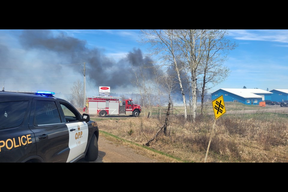 Emergency services responded on May 21 to multiple brush and grass fires near a railway line from Thunder Bay Airport to beyond Twin City Crossroads (OPP/Facebook)