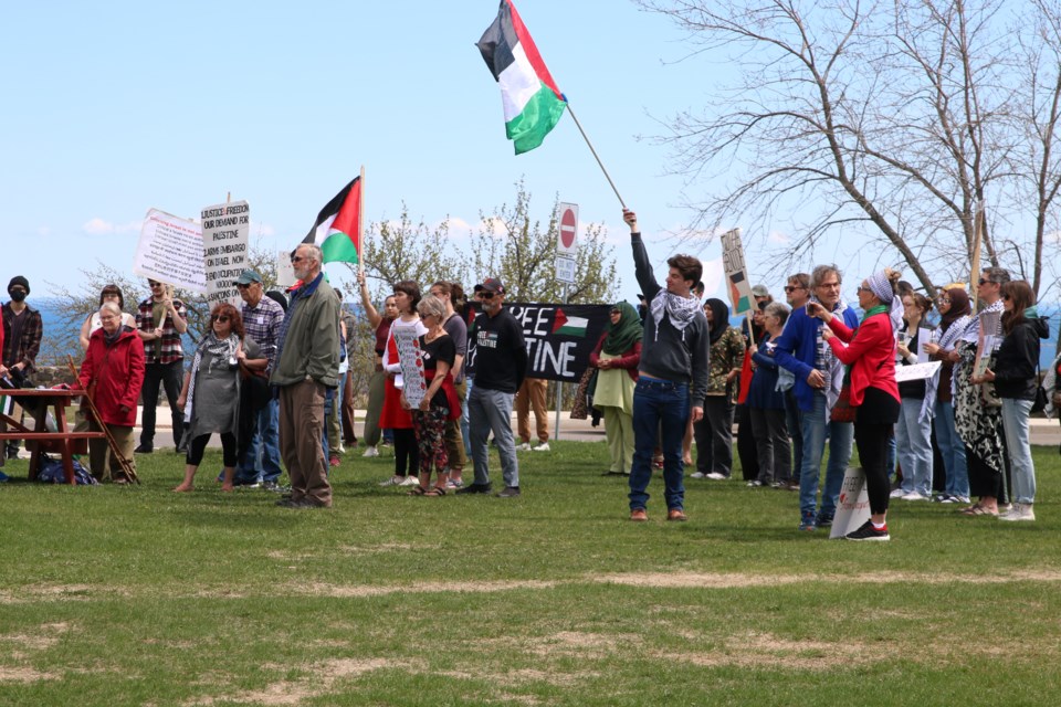 Over 60 residents show their support for the Palestinian people, many of who locally lost loved ones in Gaza, at a rally on Hillcrest on May 25.