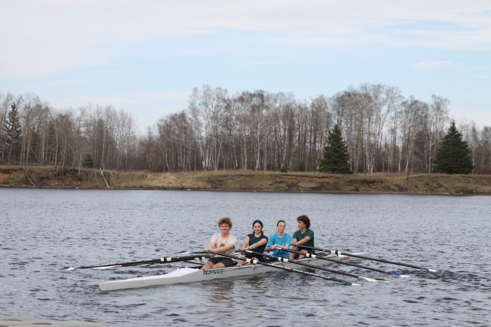 Members of the Thunder Bay Rowing Club's high school program practices on May 14, 2025.