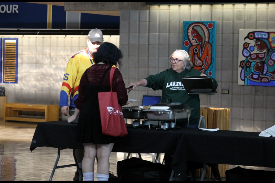Lakehead University President Gillian Siddall serving pancakes at the president's pancake breakfast for the first day of school at Lakehead University in the Agora on Sept. 2, 2025.