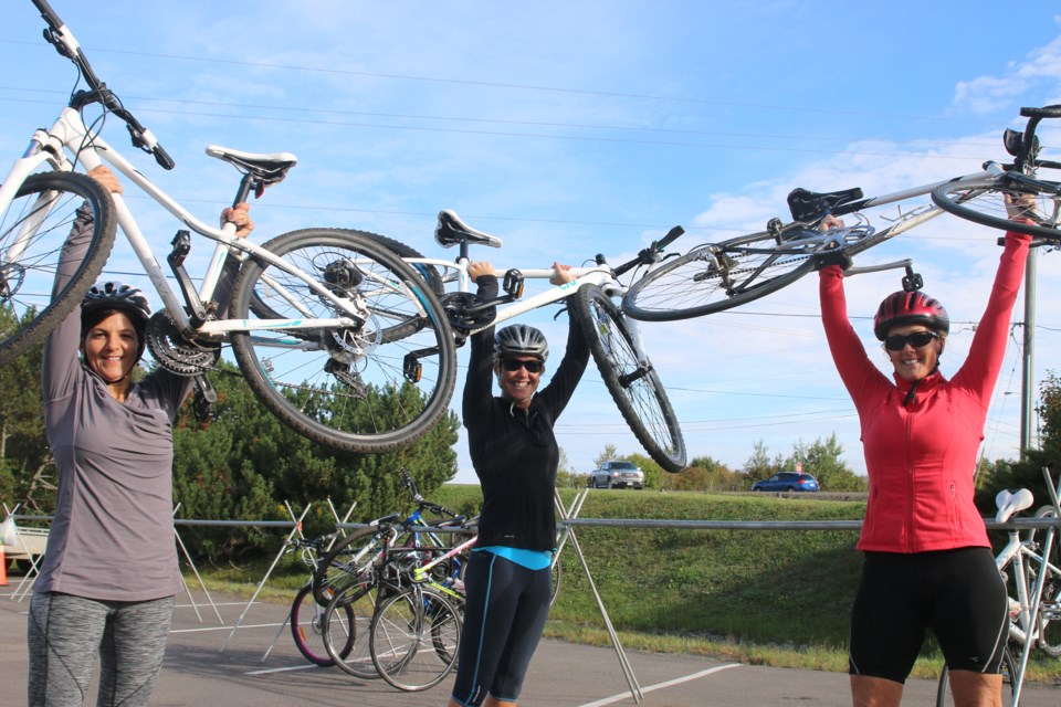 Lisa Rybak, Dana Cava, and Kathleen Wowchuk get ready for the 50k route during the 8th Annual Caribou Charity Ride on Sunday. (Photo by Doug Diaczuk - tbnewswatch.com). 