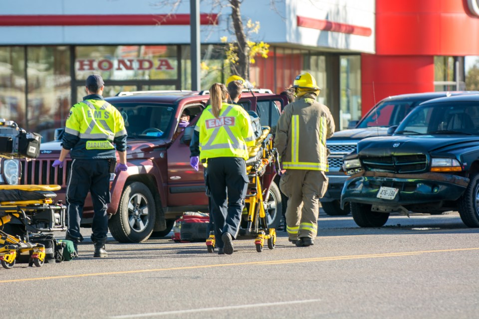Emergency crews arrive to a three vehicle crash on Memorial just after 5 p.m. Friday. (photo by James Brown, for tbnewswatch.com)
