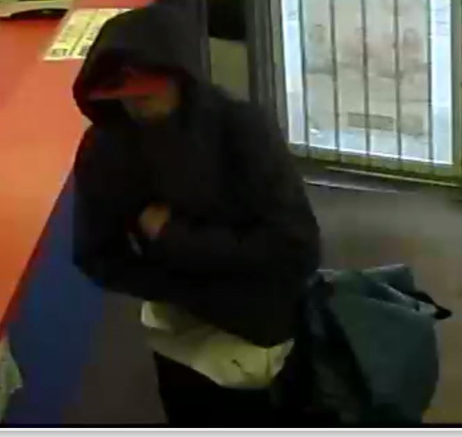 Police are hopeful the public can help identify this suspect wanted in a Sept. 10 robbery at Barb's Laundromat on May Street (Submitted photo). 