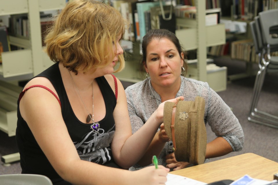 Students and staff at Westgate High School examined artifacts from the First World War during a grade 10 Canadian history lesson on Monday. 