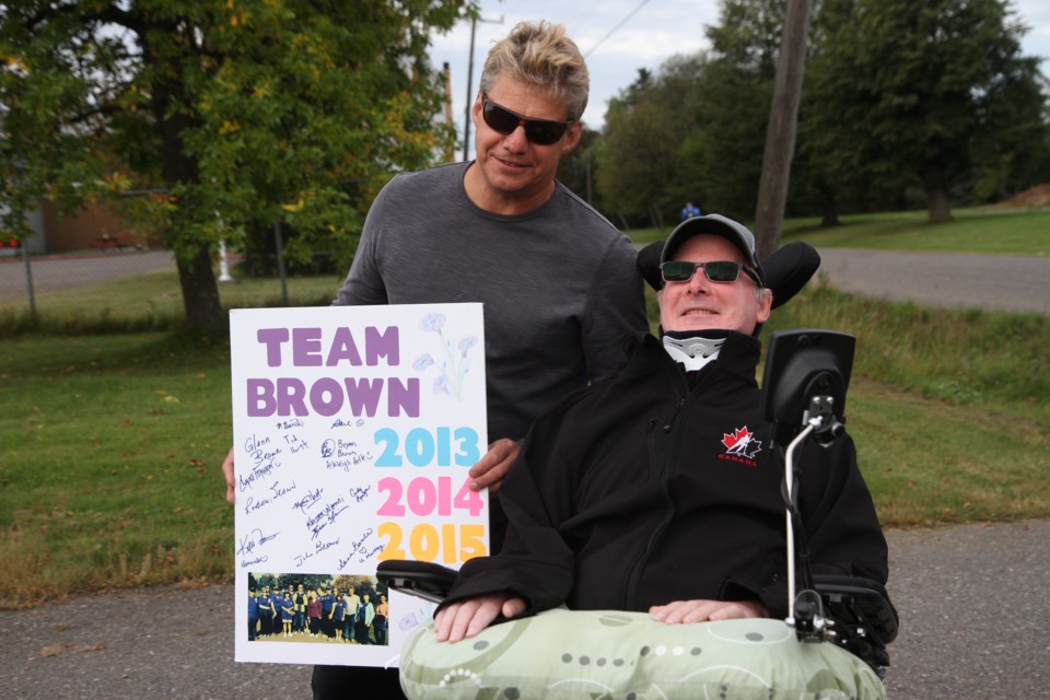 Ted Horst (left) and Murray Brown take part in the Thunder Bay Walk for ALS Saturday morning.