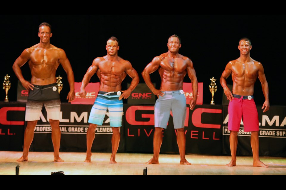 Brian Sippala (from left); Nial Beatty; Rylan Forrest and Terry Smith take part in the Mens' Physique Tall competition at the 2017 Thunder Bay Physique Championships at St. Patrick High School on Saturday; April 29; 2017 (Leith Dunick; tbnewswatch.com).