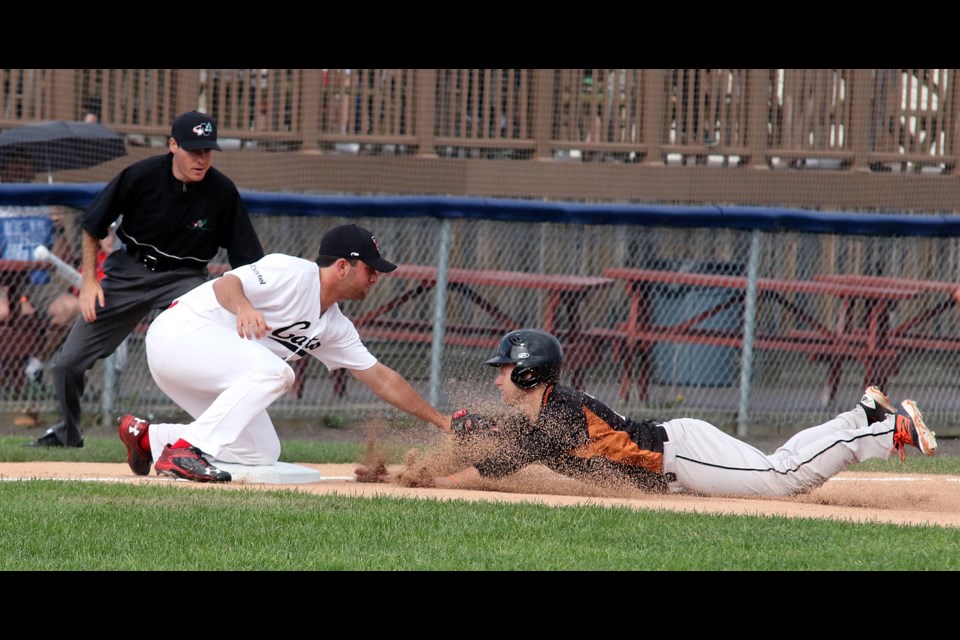 Border Cats third baseman Kevin Biondic tags out a diving Rudy Rott attempting to steal third in the second inning on Saturday, June 17, 2017 at Port Arthur Stadium (Leith Dunick, tbnewswatch.com). 