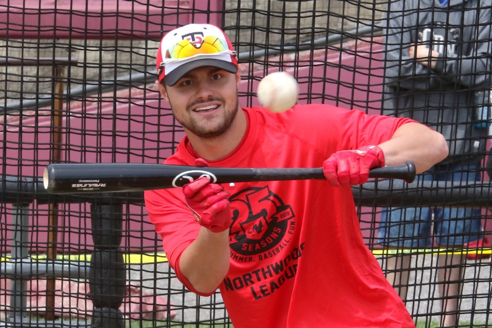 Catcher Trent Althmann lays down a bunt on Sunday, May 27, 2018 during batting practice at Port Arthur Stadium. (Leith Dunick, tbnewswatch.com)