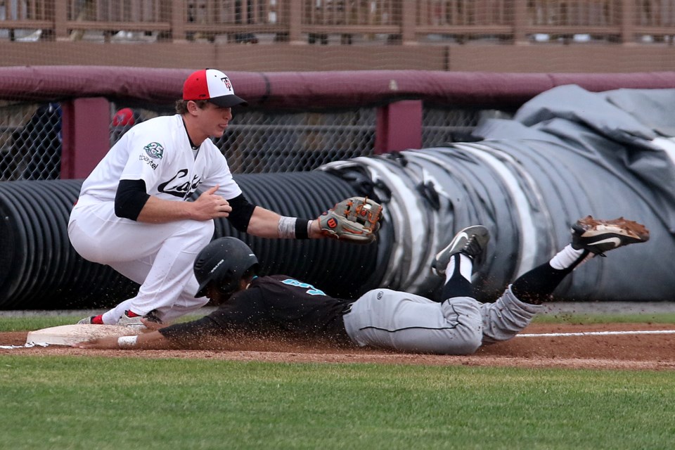 Rochester's Jaylon McLaughlin safely steals third against Thunder Bay's Billy Cook on Saturday, June 16, 2018 at Port Arthur Stadium. (Leith Dunick, tbnewswatch.com)