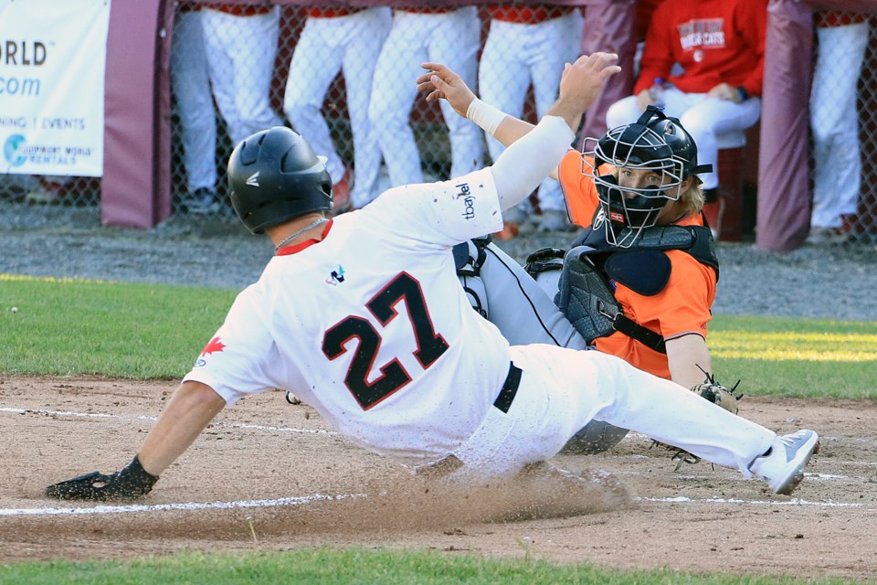 Eau Claire catcher Byron Blaise tags out Thunder Bay's Cole Ketzner on Monday, June 3, 2024 at Port Arthur Stadium. (Leith Dunick, tbnewswatch.com)