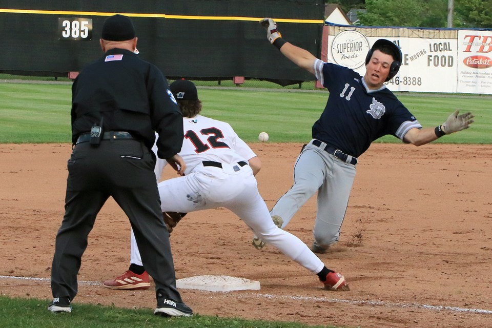 Duluth's Charlie Sutherland slides safely into third after tripling in the second innning against the Thunder Bay Border Cats on Thursday, June 6, 2024. He later homered with two on. (Leith Dunick, tbnewswatch.com)
